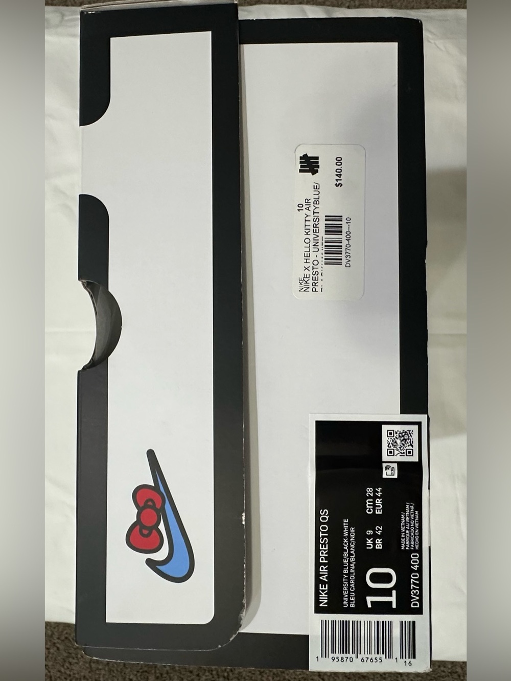 Nike White Box with Black Trim and Blue Swoosh, Red Accent